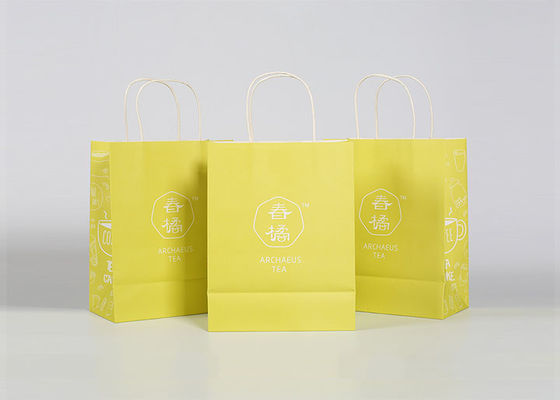 La carta torta tratta i sacchetti della spesa su ordinazione per l'imballaggio dell'abbigliamento e del regalo