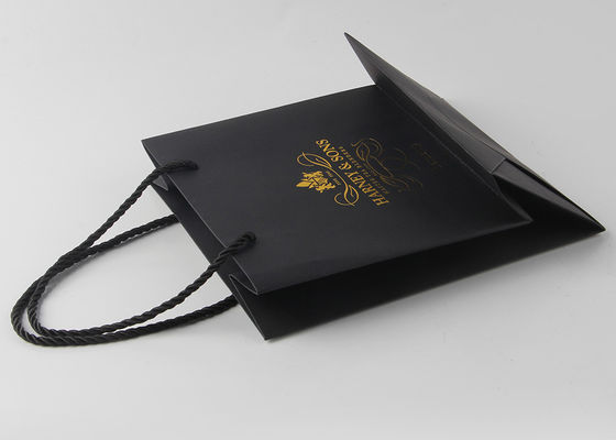 Sacchetti della spesa di carta neri riutilizzabili del boutique impressi con la timbratura d'argento
